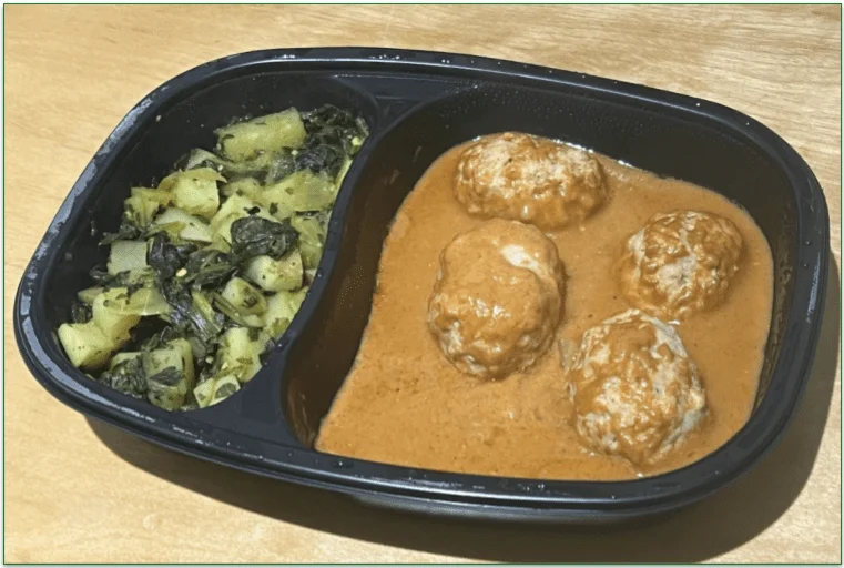 Photo of BistroMD's Chicken Masala Meatballs in a microwaveable tray