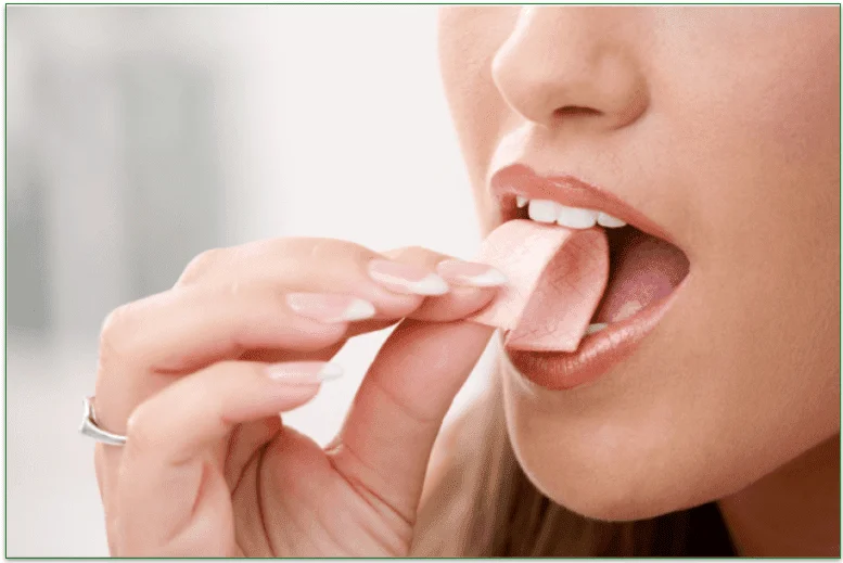 Woman about to chew some gum
