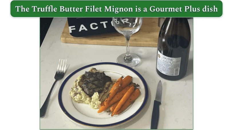 Factor’s Truffle Butter Filet Mignon on a plate with a glass of wine
