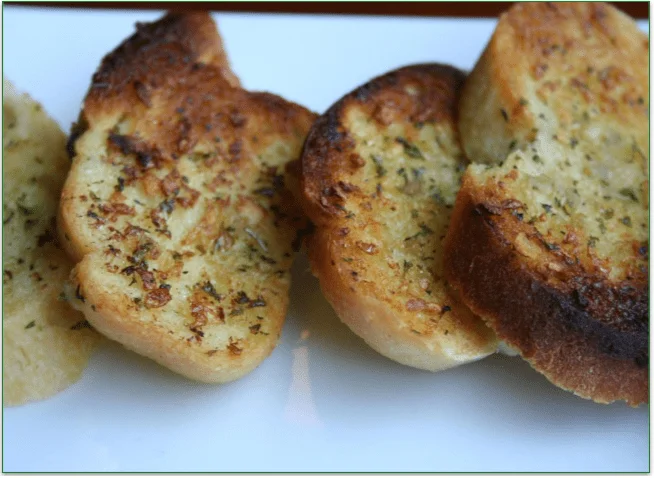 Garlic bread slices, fresh out of the oven
