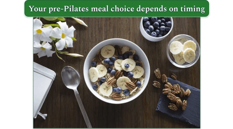 Bowl of oatmeal with banana, berries, and nuts