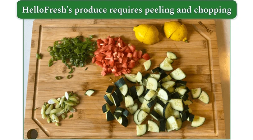 A selection of chopped vegetables and 2 halved lemons