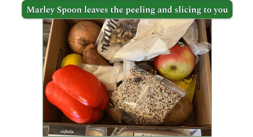 Image of an open Marley Spoon showing whole vegetables at the top