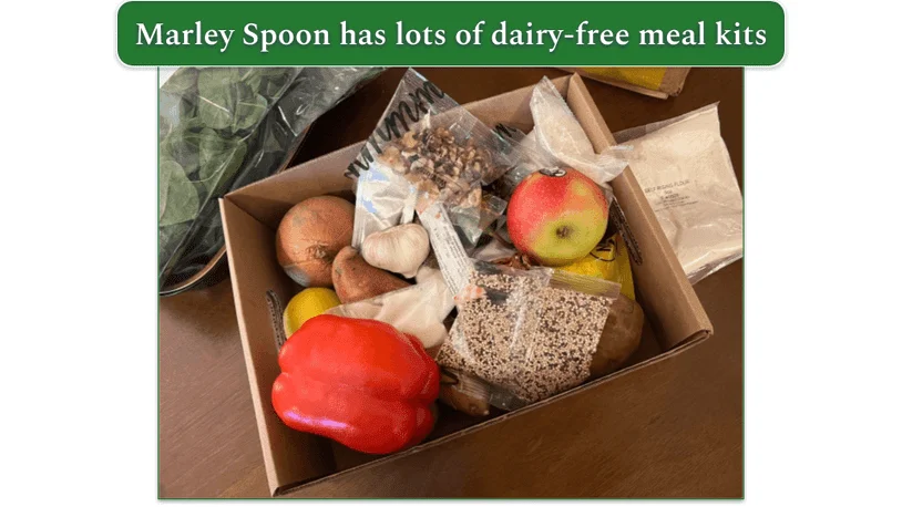 An open Marley Spoon box with dairy-free ingredients