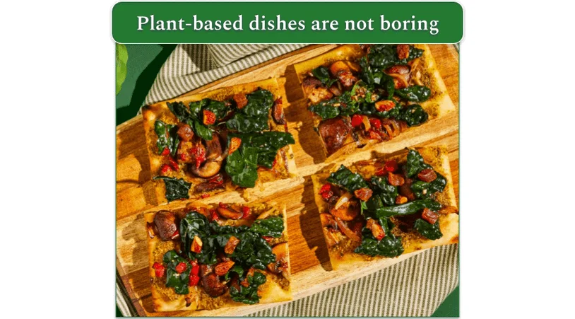 Four pieces of Vegan Pesto & Spinach Salad Tart on a chopping board