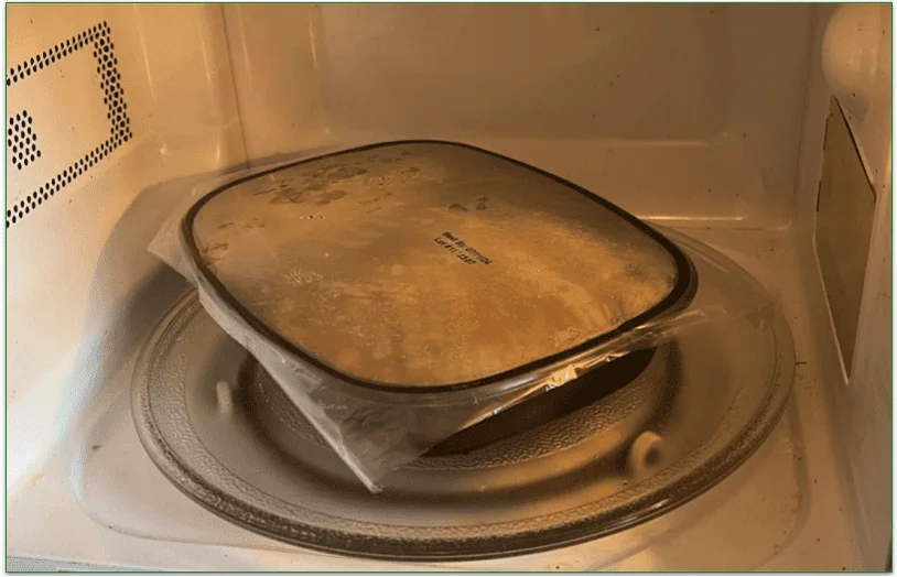 Only leave the plastic film on if heating in the microwave