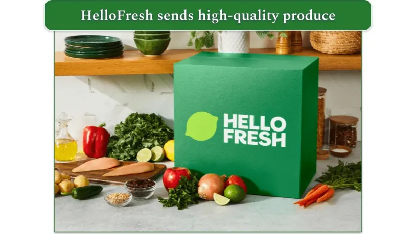 A HelloFresh box surrounded by fresh produce