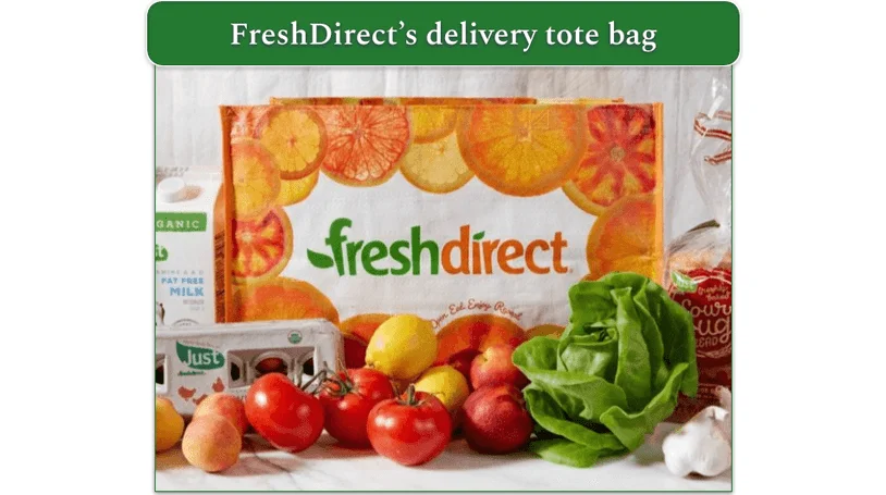Image of FreshDirect's delivery tote surrounded by groceries