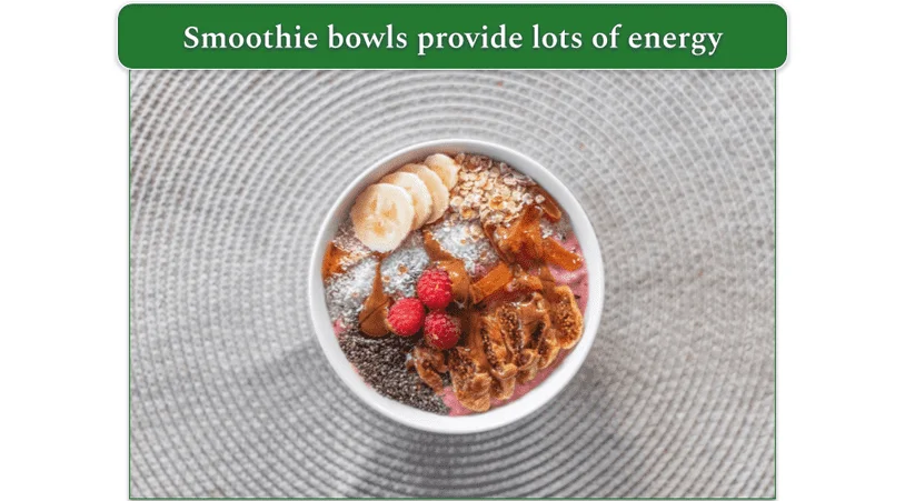 Smoothie bowl topped with seeds and fruit