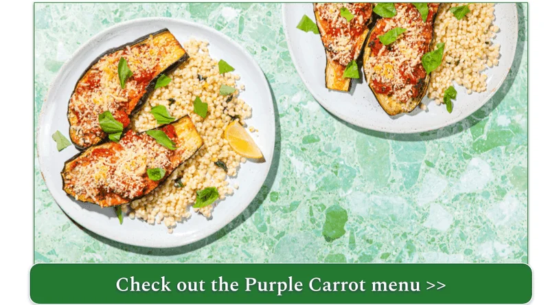 Two dishes of vegan Eggplant Parmesan