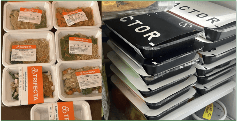 Trifecta's meals in microwaveable trays next to Factor's meals stacked in a fridge