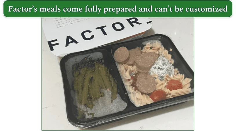 An image of Factor’s sausage and creamy spinach fusilli before being heated in the microwave