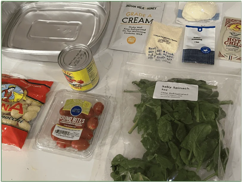Blue Apron meal kit laid out on work surface