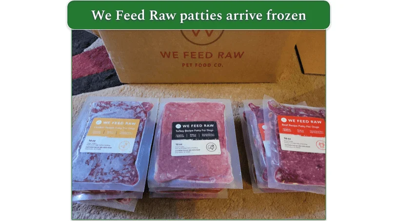 We Feed Raw packages unboxed showing turkey, chicken, and beef