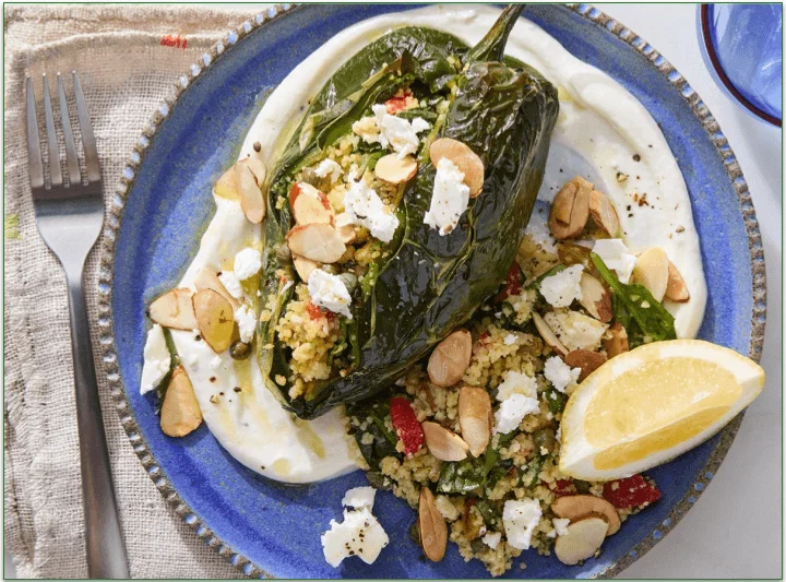 The Stuffed Poblano Peppers With Spinach, Raisins, & Tahini Dressing from Blue Apron.