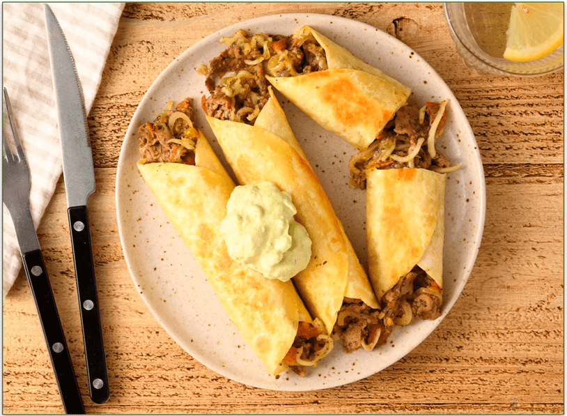 Home Chef's Argentinian-Style Steak Flautas with guacamole crema