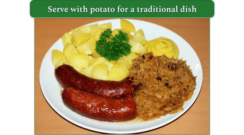 Sausage, sauerkraut, and potato served with parsley and mustard