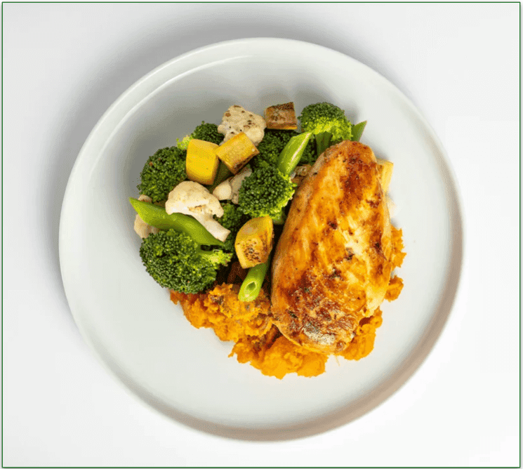 A plate of Trifecta's Chicken Breast, Sweet Potato, Mixed Vegetables Meal