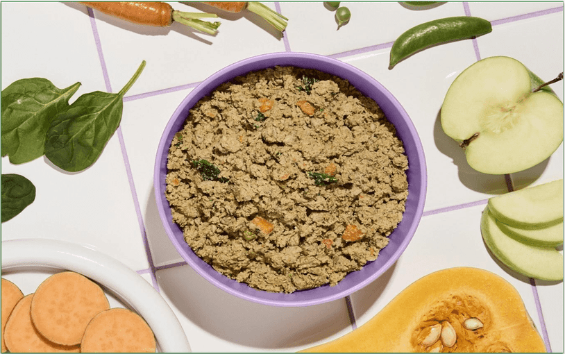 Ollie's fresh pork meal surrounded by ingredients