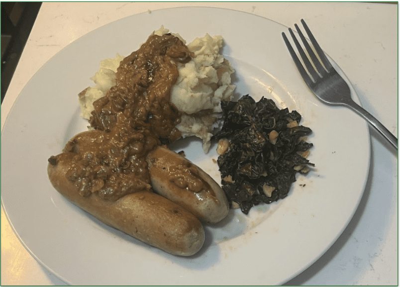 Marley Spoon's Bratwurst with Onion Sauce and mashed potatoes on a plate