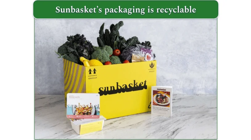 Image of fresh vegetables in a Sunbasket box with Fresh & Ready meals next to it
