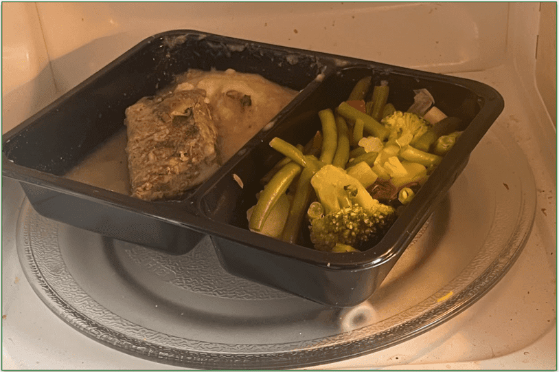Diet-to-Go's Asian Steak dish being microwaved