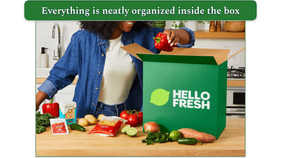 Woman unpacking a hellofresh box