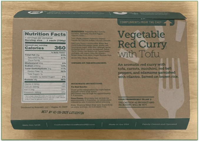 The back of one of BistroMD's cardboard meal sleeves showing nutrition facts and microwave heating instructions