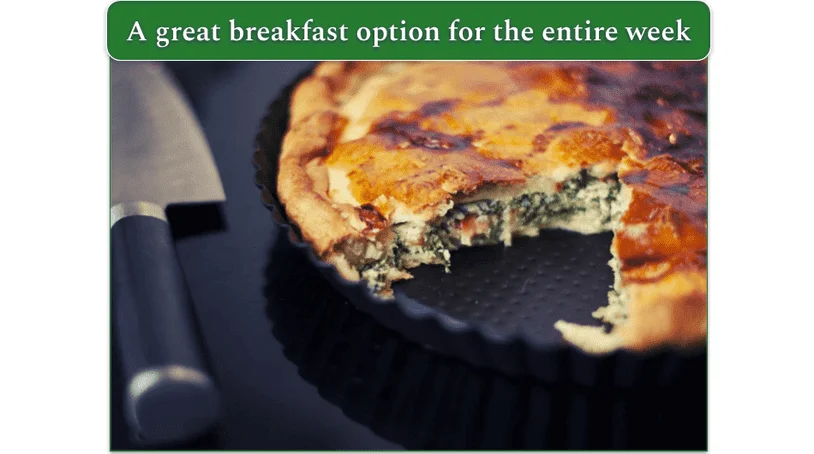 A quiche out of the oven, with 1 serving missing