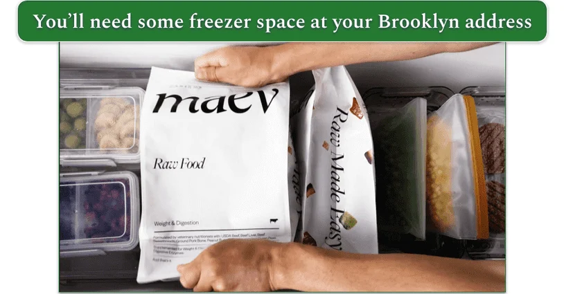 Image of a Maev package being lifted out of the freezer