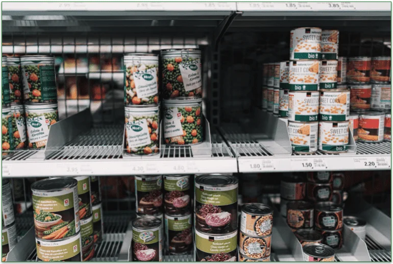 Grocery store with canned vegetables on the shelves