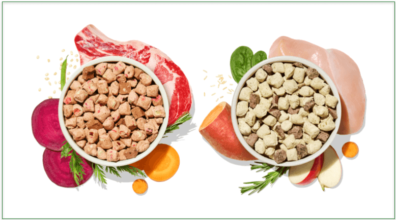Spot and Tango Unkibble in 2 bowls surrounded by fresh ingredients