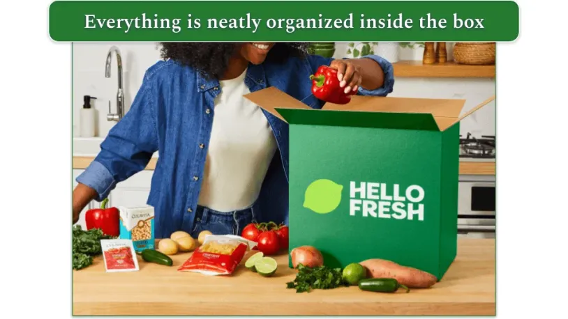 Woman unpacking a hellofresh box