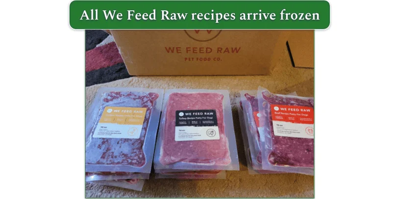 Three stacks of frozen We Feed Raw recipes