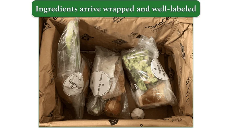 Unboxed Purple Carrot order showing individually wrapped ingredients