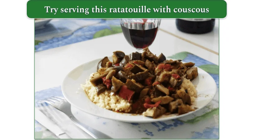 Ratatouille served with couscous and a glass of red wine