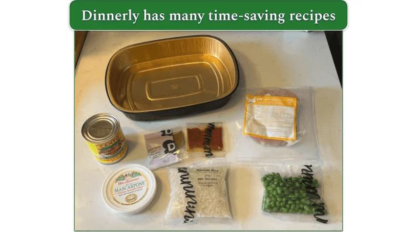 A disposable baking sheet surrounded by Dinnerly ingredients