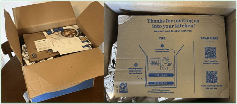 photo of an open Blue Apron delivery box on a table next to a Tips and QR codes cardboard information sheet that is on the top of the foil insulation material in the Blue Apron box.