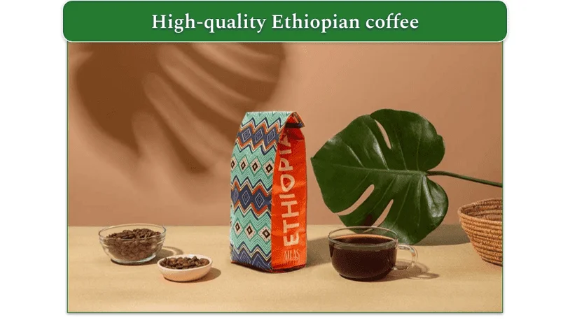 Image of Atlas Coffee Club's Costa Rican coffee with whole beans, a bag of coffee, and a cup of coffee displayed