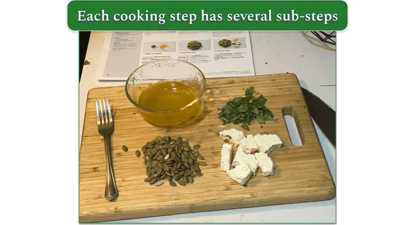 A Marley Spoon recipe card with a bowl of vinaigrette and chopped ingredients in front of it