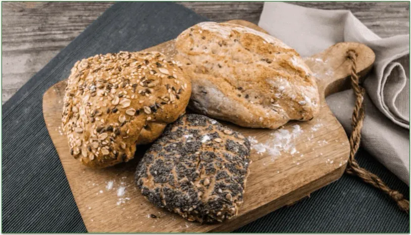Assorted loaves of bread on display