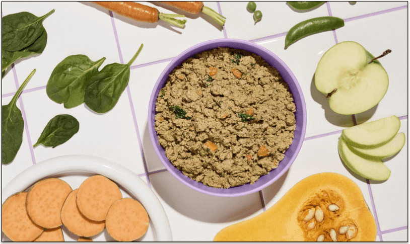 ollie fresh pork meal in a bowl surrounded by ingredients