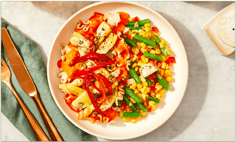 Roasted Artichoke & Red Pepper Cream Lasagnette with Green Bean, Corn & Bell Pepper Sauté (450 calories)