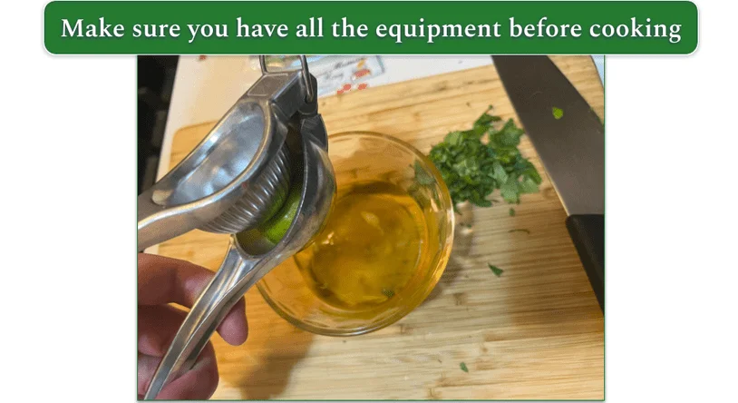 Image of our reviewer juicing a lime as part of meal kit prep