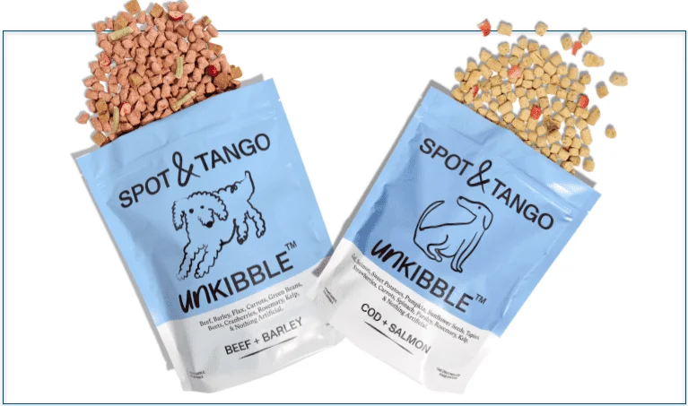 Two overflowing bags of Spot & Tango's dry food