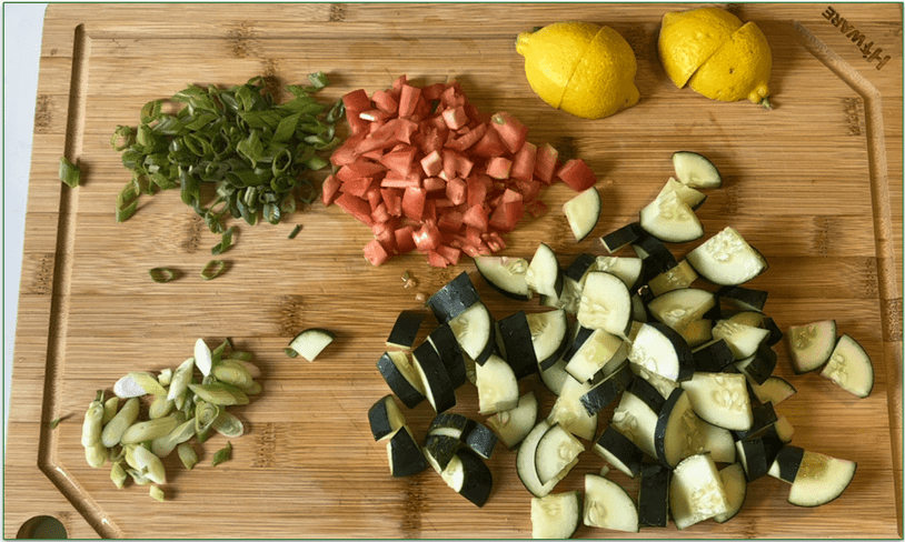 Photo of colorful chopped vegetables on a chopping board