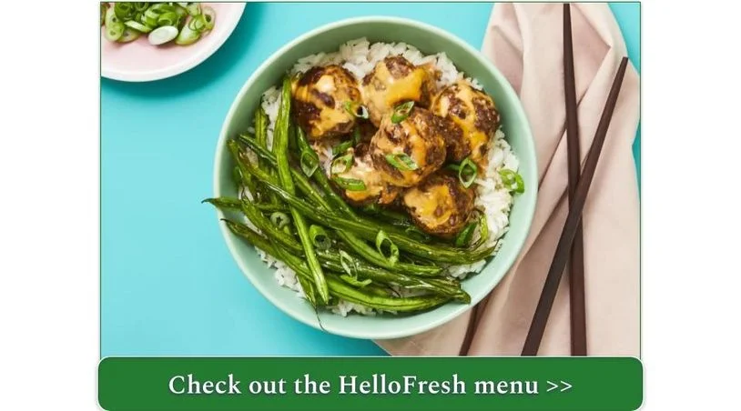 A plate of meatballs and greenbeans over rice