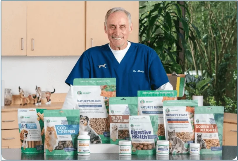 Veterinarian Dr Marty standing behind the Dr Marty Pets product range