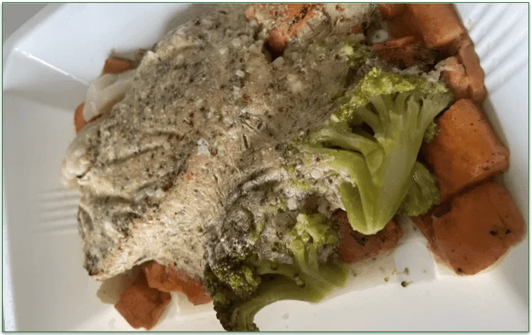 Photo of Trifecta'a Mustard Sauce Chicken Breast meal in the microwaveable tray