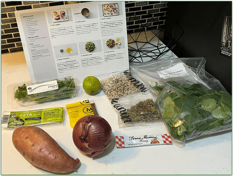 Ingredients laid out for Marley Spoon’s Superfood Spinach & Quinoa Salad